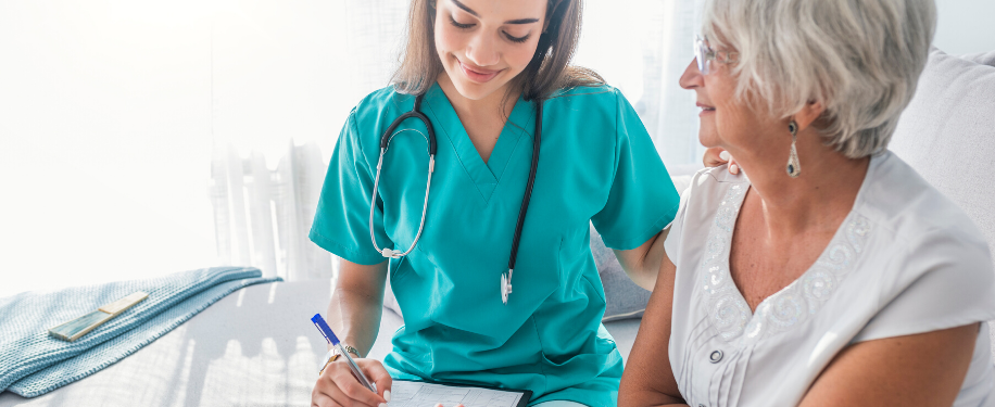 Brown Haired Nurse Taking Notes with A Patient